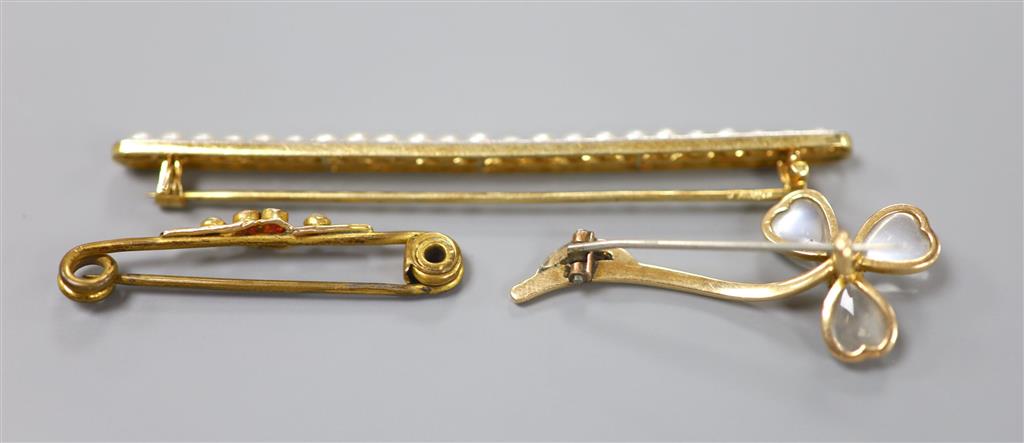 3 x brooches.